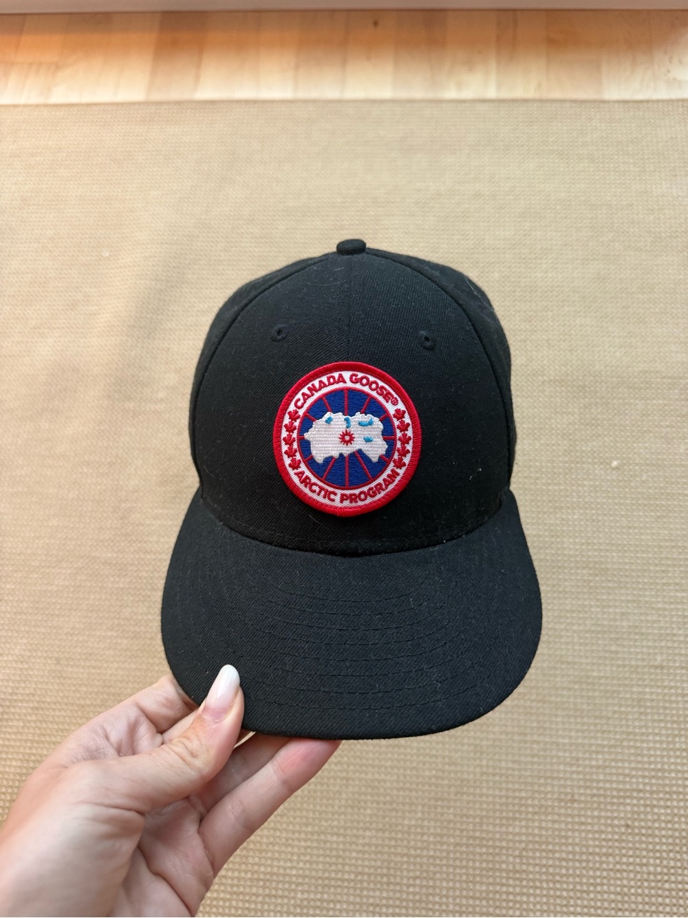Canada Goose Black Cap with Red and White Logo Patch